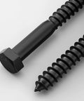 Close-up of black zinc-plated hex lag screws and washers from 26 Piece Set Of One Quarter By One And One Half Inch Hex Lag Screws With Flat Washers For Wood, 304 Stainless Steel Black Zinc Plated, Heavy Duty Lag Bolts, Includes 26 Washers And A Seven Sixteenth Inch Hex Driver Bit.