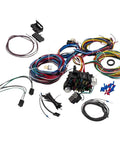 Universal 12V Wiring Harness And Fuse Kit With Plug And Play Connector, 21 Circuits And 17 Fuses laid out on white background.