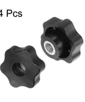 2 black plastic star knobs with M10 female-threaded hole and metal insert