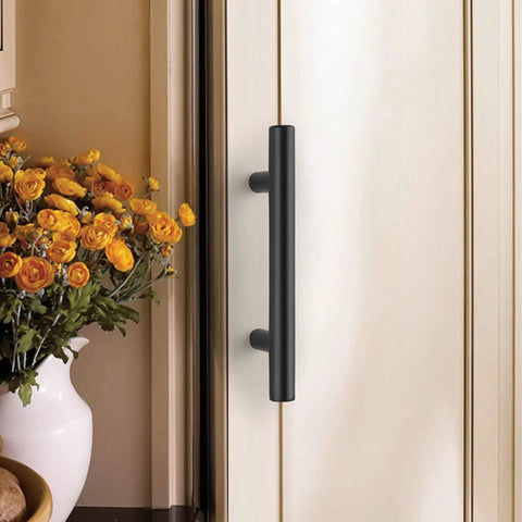 Flat Black 3 Inch Center To Center Bar Cabinet Pulls 5 Pack mounted on kitchen cabinet