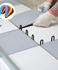 Four-color plastic horseshoe tile shims for leveling; blue, red, yellow, black U-shaped spacers