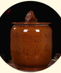Big Boy Ceramic Rice Jar With Rattle Proof Lid Heavy Duty Porcelain Kitchen Dispenser To Keep Your Grains Coffee Flour And Nuts Fresh Vintage Brown Bulk Pantry Vault with a decorative lid.