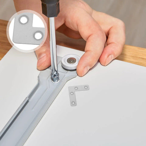 Hand installing 100-Piece Stainless Steel L-Shape Corner Bracket Set for 2x2 Inch Small Angle Joints on cabinet