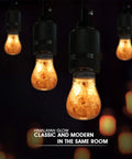 Warm Amber LED Bulbs 60W Equivalent, Dimmable E26 Edison Base, Salt Lamp Vibe Glow hanging in a dim room