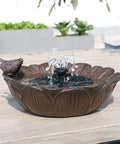 Sunflower Solar Bird Bath Fountain With Resting Bird Eco Friendly Solar Powered Outdoor Garden Water Feature With Three Nozzles Easy Setup For Bird Bath And Hummingbirds In The Yard Or Patio on wooden table