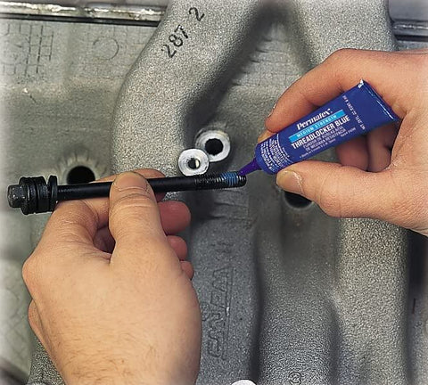 Applying Blue Medium Strength Thread Locker For Bolts And Fasteners Quarter Inch To Three Quarter Inch Keeps Vibration From Loosening