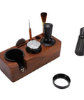 Real Deal 58mm Espresso Tamper Set With Solid Wood Station including tamper, distributor, brush, and cleaning tools.