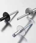 Dead Set Heavy Duty Black Aluminum Pop Rivets 3/16 X 1/2 Inch Large Cap Open End Design 150 Piece Pack, showcasing black and silver rivets.