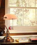 White Matte Glass Banker Desk Lamp In Retro Bronze Finish With Rotatable Lampshade on study desk near window