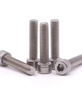 Top Tier 1/4-20 X 3/4 Inch 304 Stainless Steel Socket Head Cap Screws With Allen Hex Drive arranged on a surface.