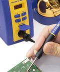 Cool Running Grip Solder Handpiece Conversion Kit With ESD Safe Micro Soldering Iron For FM 203 206 FX951 in use on circuit board