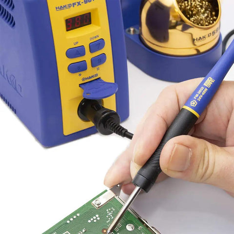 Cool Running Grip Solder Handpiece Conversion Kit With ESD Safe Micro Soldering Iron For FM 203 206 FX951 in use on circuit board
