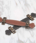 Two Pack Vintage Style PU Leather Cabinet Handles Zinc Alloy Drawer Pulls with smooth grip, brown and black leather on marble surface.