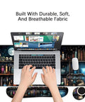 Memory Foam Keyboard Wrist Rest And XXL Extended Gaming Mouse Pad Set For Ergonomic Comfort Pain Relief Easy Typing 4 Piece Ultra Thick Desk Mats With Enchanted Bookshelf Design shown on a desk with laptop and coffee cup