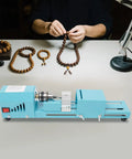 96W Mini Wood Lathe Machine With Pure Copper Motor 7 Adjustable Speeds For Hobbyist Woodturning Drilling Engraving And Sanding Tasks, used for crafting wooden necklaces.