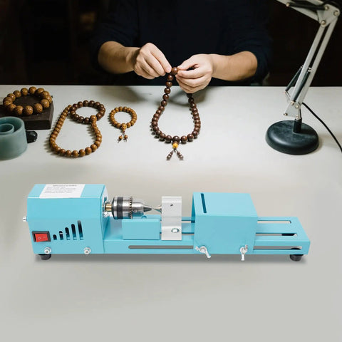 96W Mini Wood Lathe Machine With Pure Copper Motor 7 Adjustable Speeds For Hobbyist Woodturning Drilling Engraving And Sanding Tasks, used for crafting wooden necklaces.
