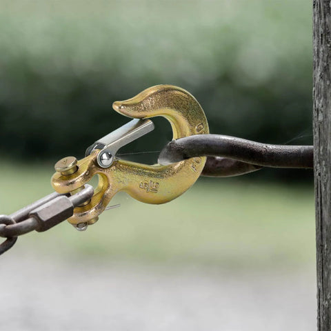 Close-up of a Five Sixteenth Inch Clevis Slip Hook with Latch, Forged G70 Steel, used with chain, for truck and trailer winch, yellow zinc finish.