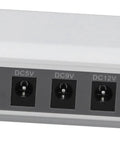 Solid Mini Ups With Six Thousand Mah Battery To Keep Your Wifi Router And Modem Running Smooth Through Power Blackouts And Internet Downtime Without A Hitch At Home Or Office power input ports close-up.
