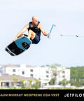 Person wakeboarding wearing CGA Approved Neoprene PFD Vest For Water Sports Boat Ready Lightweight Flex Lite Foam