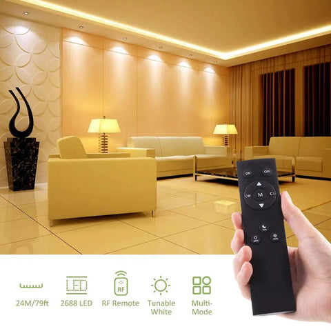 Living room lit by 79 Ft Tunable White LED Strip Light Kit With 2688 LEDs Dimmable 3000K To 6500K 24V, showing RF remote control.