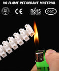 12-Position Dual Row White Screw Terminal Block Set 10 A 380 V Wire Connector electrical barrier block shown near flame.