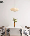 Upgrade Your Space with This Epic 20 Inch White Bubble Saucer Lantern Pendant Light Featuring Imitation Silk Shade and Sturdy Metal Frame for Modern Farmhouse Living Room Bedroom Decor Vibe Check Passed above a dining table.