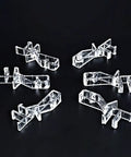 Clear Hidden Channel Valance Clips 1-7/8 Inch Set Of 22 For Wood And Faux Wood Blinds, heavy duty plastic clips on black background.