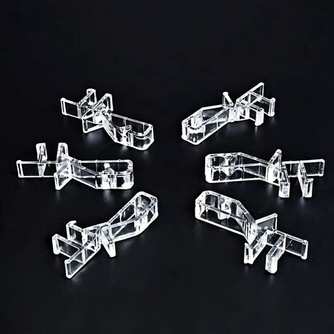 Clear Hidden Channel Valance Clips 1-7/8 Inch Set Of 22 For Wood And Faux Wood Blinds, heavy duty plastic clips on black background.