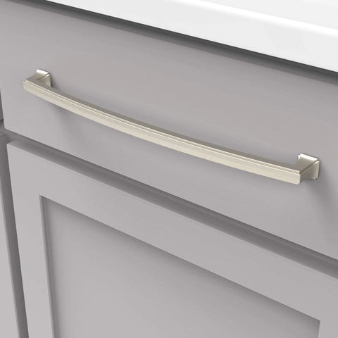 Solid Core Kitchen Cabinet Pulls in Satin Nickel 12 Inch Hole Center Bridges Collection mounted on gray kitchen cabinet