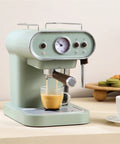 Compact White Coffee Maker And Mini Espresso Brewer With Auto Steam Frother, Heavy Duty Countertop Appliance For No Drama Daily Sips And Pull Solid Shots At Home in mint color brewing espresso.