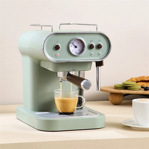 Compact White Coffee Maker And Mini Espresso Brewer With Auto Steam Frother, Heavy Duty Countertop Appliance For No Drama Daily Sips And Pull Solid Shots At Home in mint color brewing espresso.