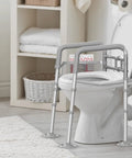 Stand Alone Toilet Safety Rail With Adjustable Width And Height Fits Any Toilet Folding Handrails For Elderly And Disabled No Fuss Tool Free Setup Portable Medical Toilet Frame Silver Grey in a bathroom setting