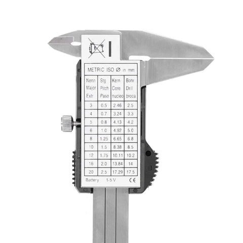 Digital Vernier Caliper 50mm 2In High Precision Measuring Tool With Dual Unit Conversion close-up on measurement scale chart