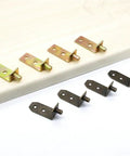 Heavy Duty Shelf Bracket Set 200Pcs Colored Zinc Cabinet Supports Studs and Pegs for Shelves and Cupboards displayed on a table