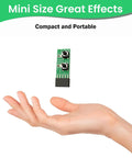9 Pin Reset And Power Switch Board Adapter held above a hand, compact and portable design for easy installation and testing.