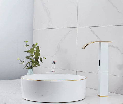 Touchless Bathroom Vessel Faucet With Motion Sensor No-Touch Hands Free Deck Mounted Water-Saving Lavatory Tap In White Gold One-Hole Bowl Sink Faucet For Vanity with plant and toothbrushes.