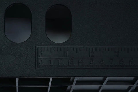 Close-up of measurement markings on Five In One Workbench Table With Adjustable Height And Clamping Surface That Doubles As Scaffold Dolly And Creeper Do It All Orange And Black Multi Purpose Work Station
