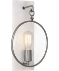 One Light Wall Sconce With Dark Antique Nickel Finish And Clear Seeded Glass rock solid construction in circular design.