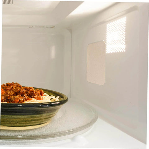 Microwave interior showing installed Mica Waveguide Cover with dish, Microwave Mica Waveguide Cover Insulation Sheets 10 Pack, Heat Resistant.