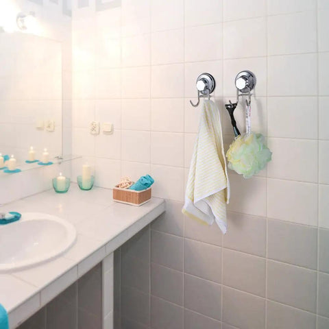 Powerful Vacuum Suction Cup Hooks for Shower and Bathroom on Flat Smooth Surfaces Like Ceramic Tile Glass Mirror Granite and Stainless Steel NeverRust Black 4 Pack holding towel and sponge in bathroom