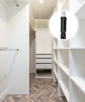 100 Piece Cam Lock Fittings With Invisible Hardware Self Tapping Cabinet Connectors And Nylon Wood Dowel Plugs mounted in a modern closet.