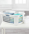 Ultra 2 Bushel Plastic Laundry Hamper Baskets, 6 Pack in White on table filled with folded clothes, heavy duty laundry sorter