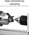High-concentration clamping of the 1200W Mini Metal Lathe Machine For Woodworking And Metal Polishing, focusing on the precision chuck.