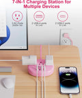 Total Game Winning Pink Extension Cord With Usb C Power Strip Five Foot Smart Charging Hub on a desk with multiple devices connected.