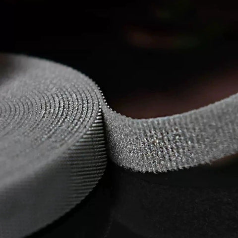 Heavy Duty Reusable Cable Management Straps White Tearable Cord Organizer Tie For Computer Speaker Guitar Wires close-up of nylon strap