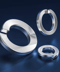 Angled view of a set of three stainless steel split lock washers for screws and bolts.