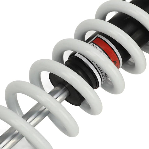 Close-up of 390mm Adjustable Shock Absorber With Damping For ATV Go Kart Motorcycle Universal Fit Beefed Up Heavy Duty CNC Aluminum Spring