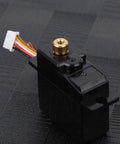 All Metal Heavy Duty Servo For 1 18 Scale Rc Car Black with gold gear top and wires, showing quick swap design and robust build.