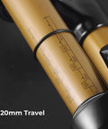 Close-up of Dope Aluminum Mountain Bike Suspension Fork with 120mm travel markings, black and gold finish.