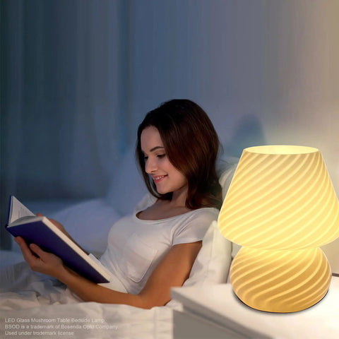 Yellow Glass Mushroom Bedside Lamp With Vintage Murano Stripe Compact Nightstand Desklamp glowing on white nightstand